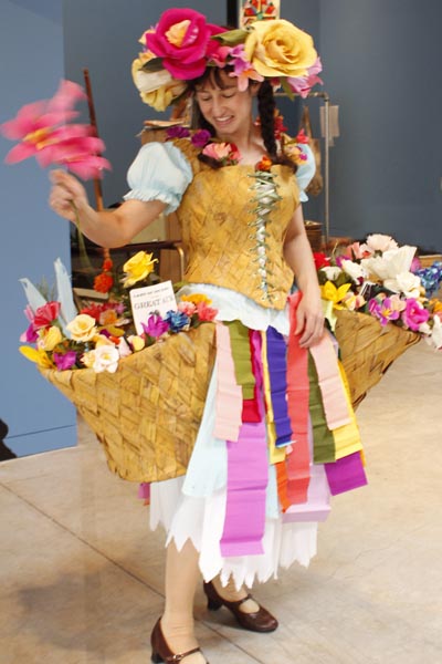 Aimee Baldwin in paper costume of crepe paper flower vendor